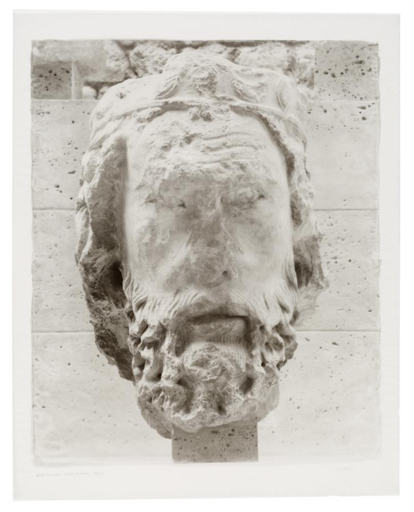 Statue called 'Head of King' in Cluny Museum located in Paris.