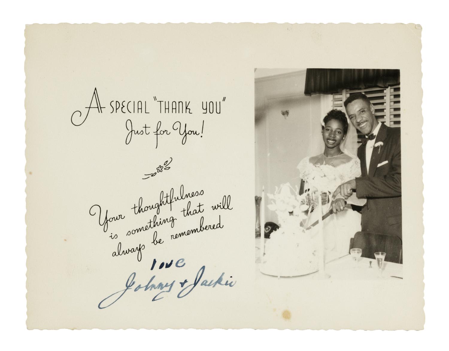 thank you card with the inscription "A Special 'Thank You' Just for You!" and a handwritten from the married couple cutting cake photographed on the card.