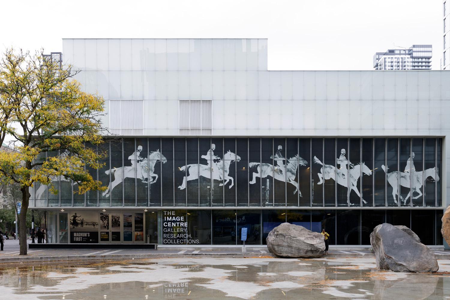 Front exterior of The Image Centre featuring a photographic negative mural of a horse in motion