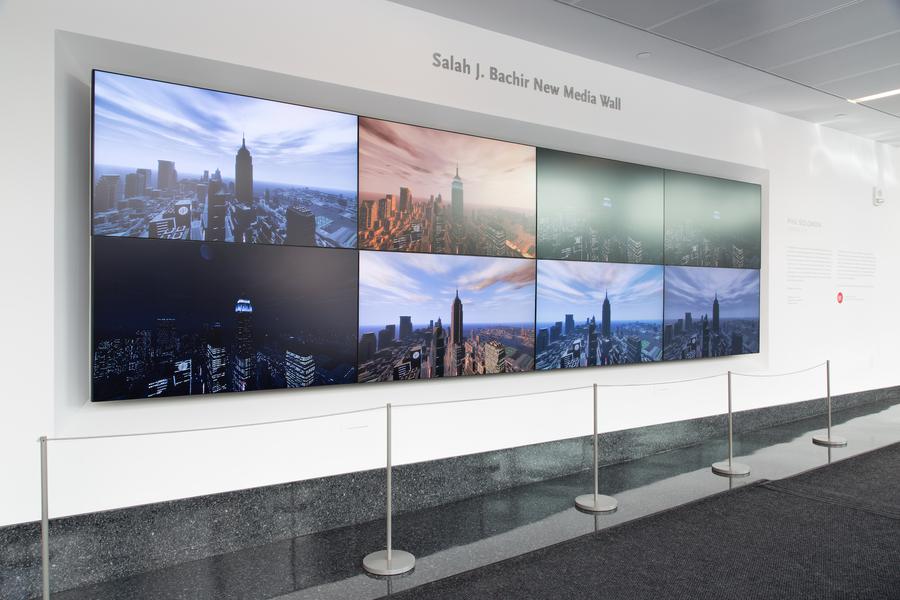 8 video stills of the New York City skyline at different times of day