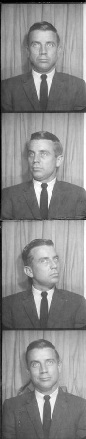 A strip of four photobooth portraits of a man.