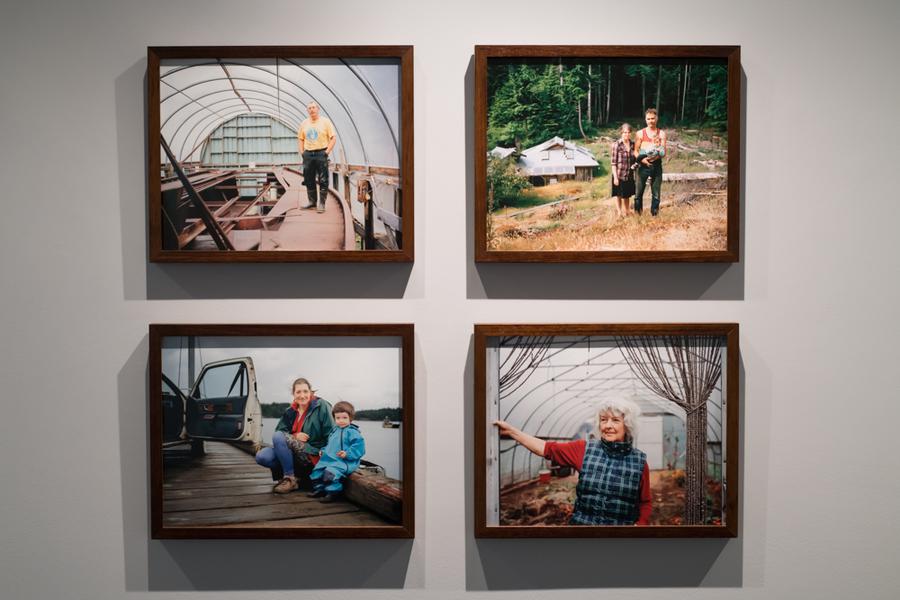 4 framed photographs hanging on a wall