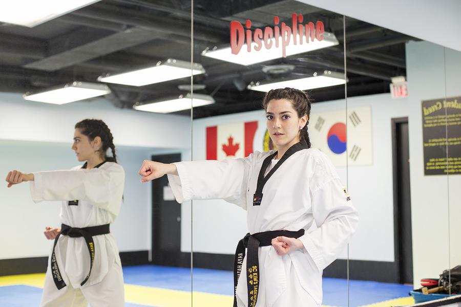 A girl in a karate uniform