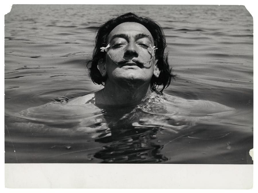 Spanish surrealist artist Salvador Dali swimming in 1953.