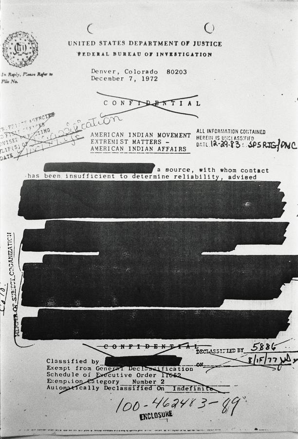 Old document titled "United States Department of Justice Federal Bureau of Investigation. American Indian Movement Extremist Matters - American Indian Affairs". Body of the text is blacked out