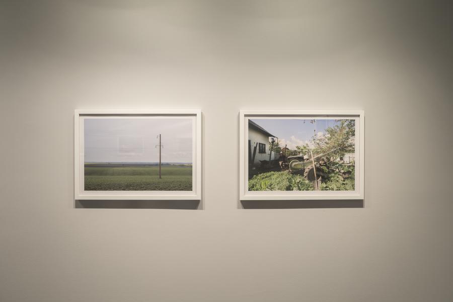 Two photographs side by side in white frames