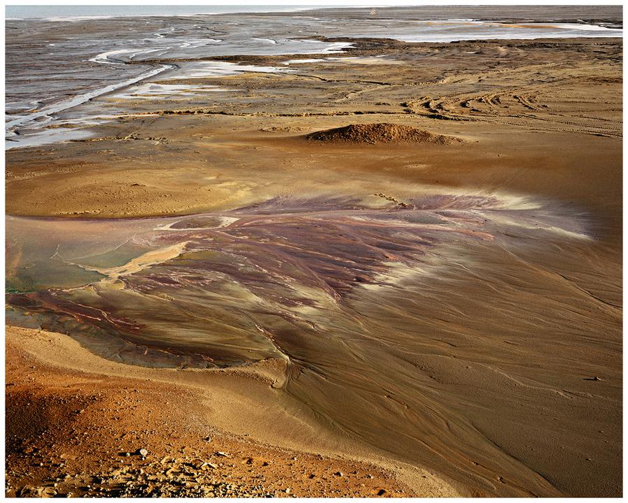 Photograph by Edward Burtynsky. Mine tailing pond