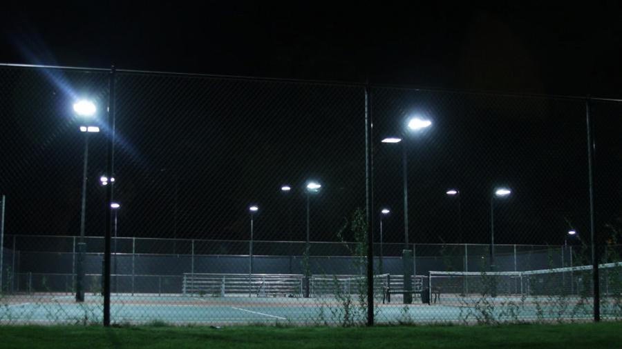 A tennis court at night