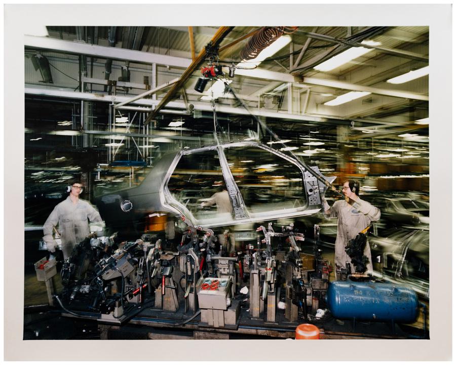 Photograph by Edward Burtynsky. Workers at the Ford Assembly Plant in Oakville, Ontario