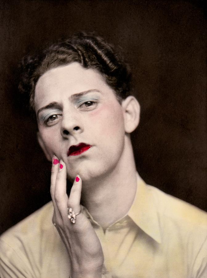 Man in make-up wearing a woman’s ring, United States. Photobooth print with colour retouching