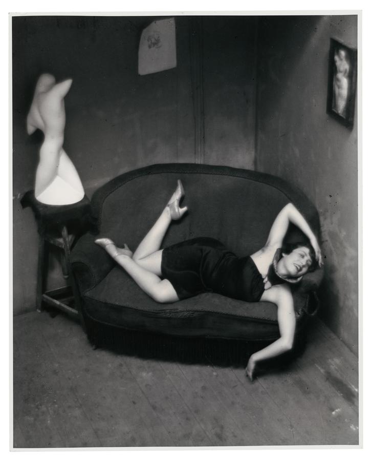 A dancer lounging on a couch.
