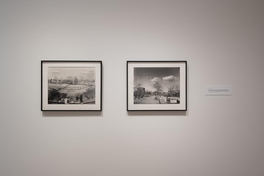 installation shot of two framed photos from the artist's milton park series.