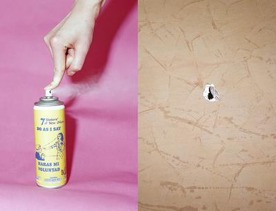 A yellow spray can sitting on a pink background