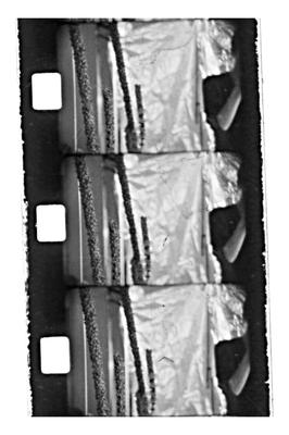 3 black and white images on a film strip